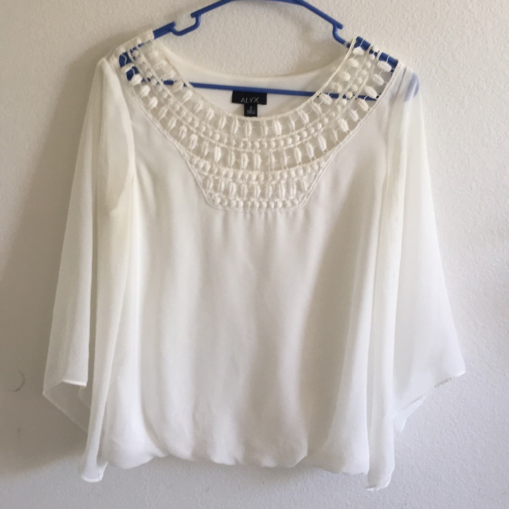 Flowy chiffon blouse with lace neckline